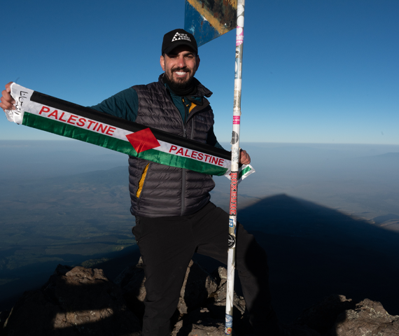 Alaa Hashim Al Juneidi Holding The Palestinian Flag